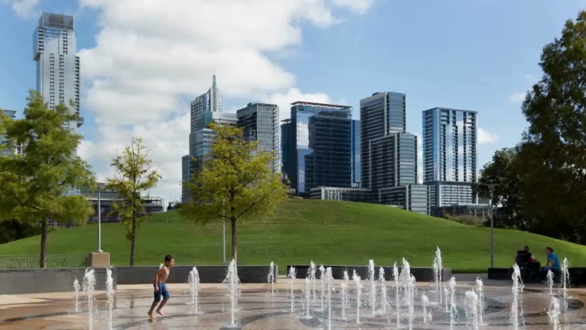 A public park and fountain in downtown Austin